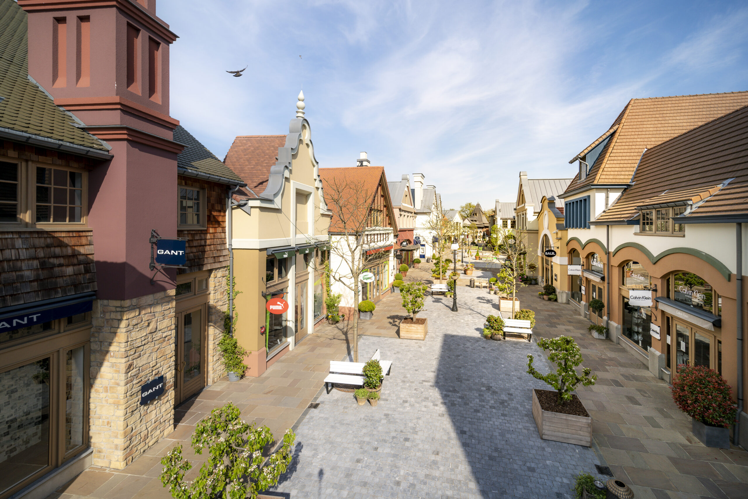 Busreizen Soldenshoppen in Maasmechelen Village • Viamundi